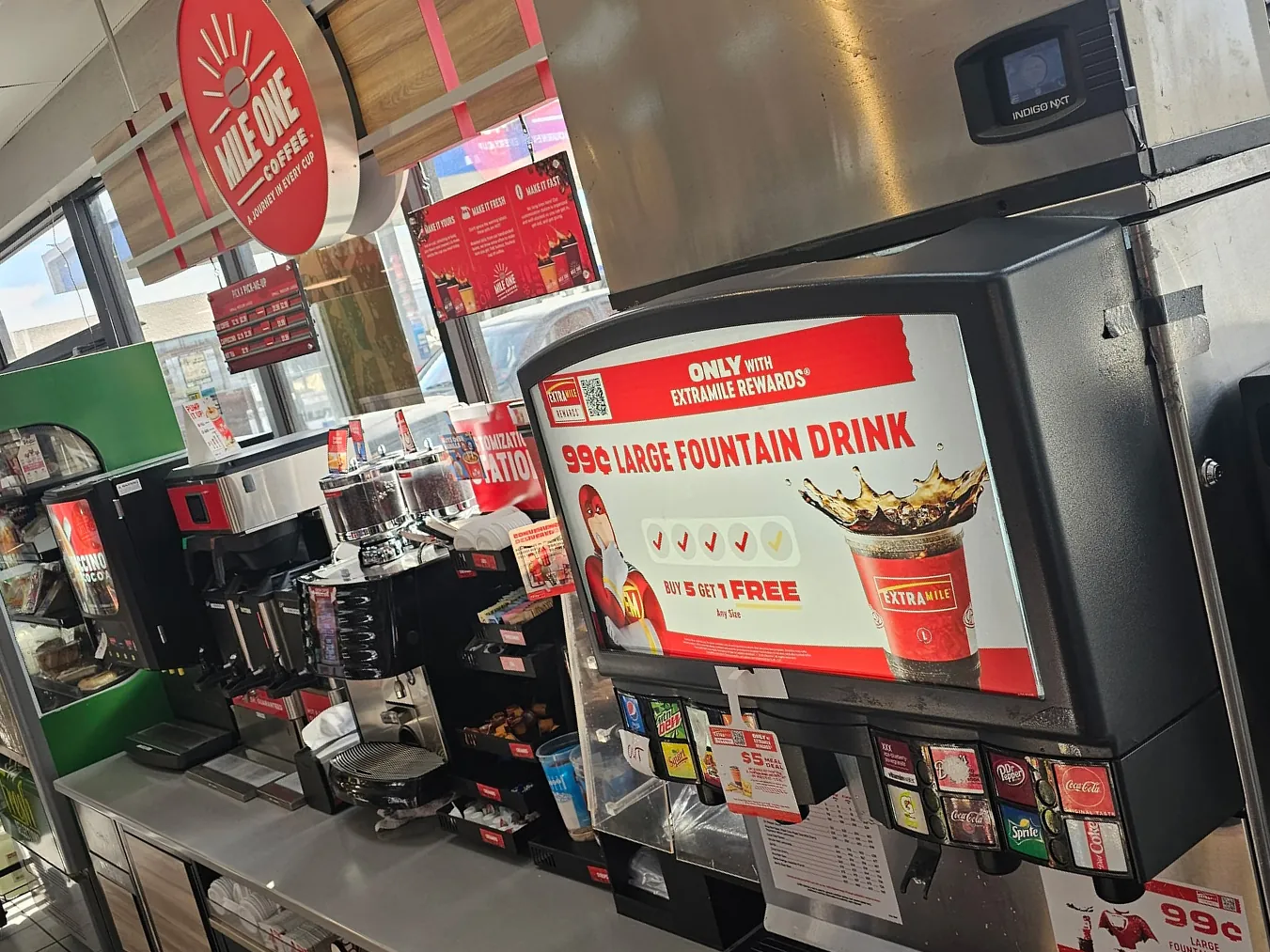 Fountain, coffee and cold brew equipment along the beverage counter of an ExtraMile convenience store