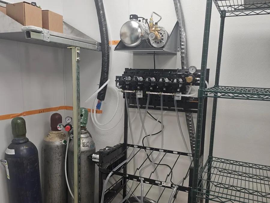 CO2 cylinders, a carbonator and a syrup rack plumbed into a back room wall at Truland Burgers and Greens